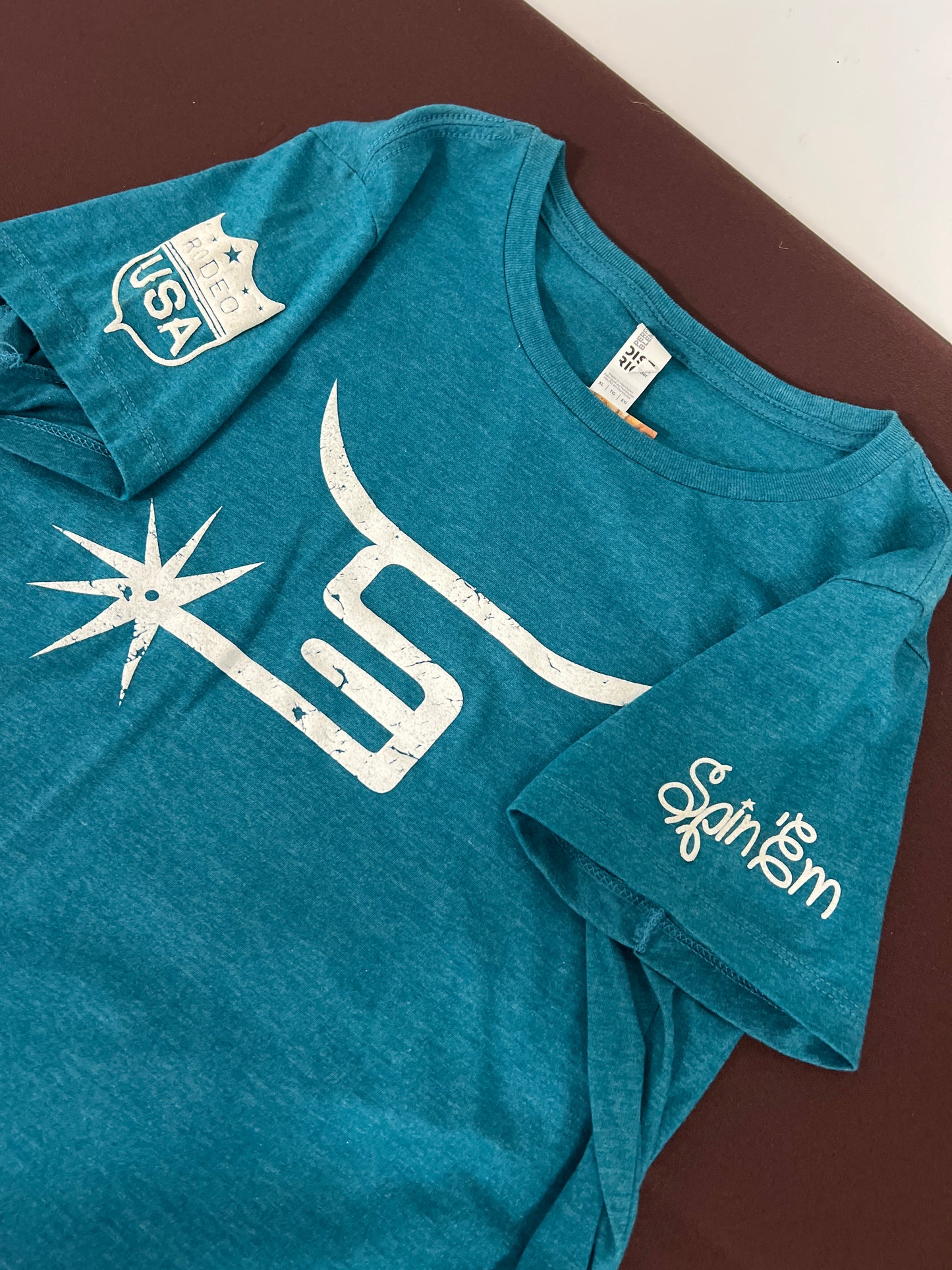 Spin Em: Ladies Turquoise Tee